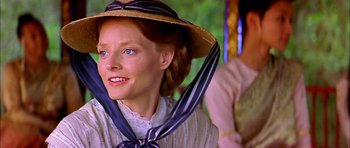 Movie still from “Anna and the King” (1999), directed by Andy Tennant – A person wearing a hat; Close Up shot, Over the shoulder angle