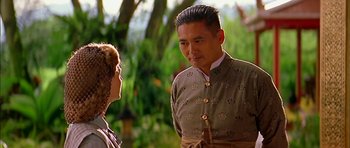 Movie still from “Anna and the King” (1999), directed by Andy Tennant – A man and a woman are talking in a forest; Close Up shot, Over the shoulder angle