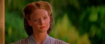 Movie still from “Anna and the King” (1999), directed by Andy Tennant – A person wearing a dress shirt; Close Up shot, Over the shoulder angle