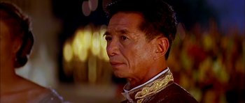 Movie still from “Anna and the King” (1999), directed by Andy Tennant – An older asian man wearing a traditional chinese outfit; Close Up shot, Low angle