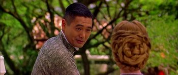 Movie still from “Anna and the King” (1999), directed by Andy Tennant – A person talking to another person; Close Up shot, Over the shoulder angle