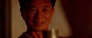 Movie still from “Anna and the King” (1999), directed by Andy Tennant – A man's face with a candle in the background; Close Up shot, Over the shoulder angle