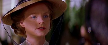 Movie still from “Anna and the King” (1999), directed by Andy Tennant – A person wearing a hat; Close Up shot, Over the shoulder angle