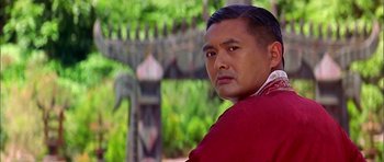 Movie still from “Anna and the King” (1999), directed by Andy Tennant – A person wearing a red shirt; Close Up shot, Low angle