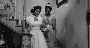Movie still from “Anna Lucasta” (1958), directed by Arnold Laven – A black and white photo of two women; Medium shot, Over the shoulder angle