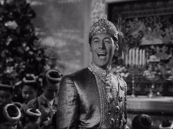 Movie still from “Anna and the King of Siam” (1946), directed by John Cromwell – A black and white photo of a man wearing a crown; Close Up shot, Low angle
