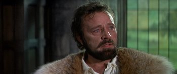 Movie still from “Anne of the Thousand Days” (1969), directed by Charles Jarrott – A person with a beard; Close Up shot, Over the shoulder angle