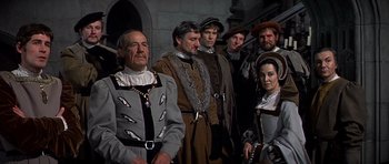 Movie still from “Anne of the Thousand Days” (1969), directed by Charles Jarrott – A group of people standing next to each other; Medium shot, High angle