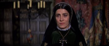 Movie still from “Anne of the Thousand Days” (1969), directed by Charles Jarrott – A person wearing a dress; Close Up shot, Over the shoulder angle
