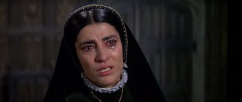 Movie still from “Anne of the Thousand Days” (1969), directed by Charles Jarrott – A person with a crying face; Close Up shot, High angle