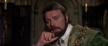 Movie still from “Anne of the Thousand Days” (1969), directed by Charles Jarrott – A person with a beard; Close Up shot, Over the shoulder angle