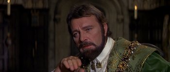 Movie still from “Anne of the Thousand Days” (1969), directed by Charles Jarrott – A person with a beard; Close Up shot, Over the shoulder angle
