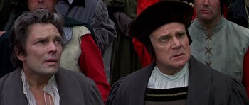 Movie still from “Anne of the Thousand Days” (1969), directed by Charles Jarrott – A person wearing a hat; Close Up shot, Over the shoulder angle