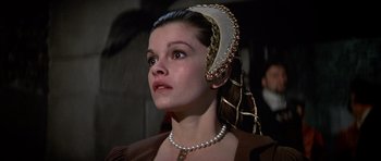 Movie still from “Anne of the Thousand Days” (1969), directed by Charles Jarrott – A person wearing a headpiece; Close Up shot, Low angle