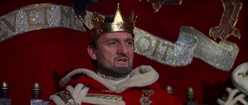 Movie still from “Anne of the Thousand Days” (1969), directed by Charles Jarrott – A person wearing a costume and a crown; Close Up shot, Low angle