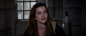 Movie still from “Anne of the Thousand Days” (1969), directed by Charles Jarrott – A woman with long brown hair looking up at the sky; Close Up shot, Low angle