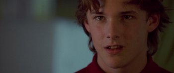 Movie still from “Apt Pupil” (1998), directed by Bryan Singer – A young man's face; Close Up shot, Low angle