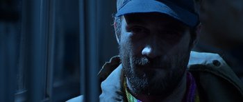 Movie still from “Apt Pupil” (1998), directed by Bryan Singer – A person wearing a hat; Close Up shot, Low angle