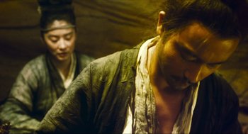 Movie still from “Ashes of Time” (1994), directed by Kar-Wai Wong – A man with a bandaged face and a man with a bandaged head; Close Up shot, Low angle
