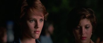 Movie still from “At Close Range” (1986), directed by James Foley – A person with short hair; Close Up shot, Low angle