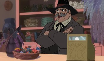 Movie still from “Atlantis: Milo's Return” (2003), directed by Tad Stones – A man in a black hat and a brown suit; Medium shot, Over the shoulder angle