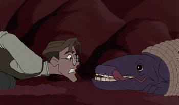 Movie still from “Atlantis: Milo's Return” (2003), directed by Tad Stones – An animated scene of a man looking at a whale; Close Up shot, High angle