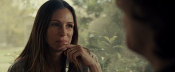 Movie still from “August: Osage County” (2013), directed by John Wells – A person sitting in front of a window; Close Up shot, Over the shoulder angle