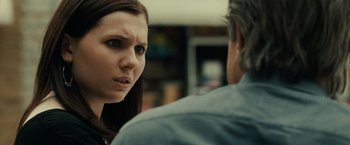 Movie still from “August: Osage County” (2013), directed by John Wells – A young woman and older man talking to each other in a room; Close Up shot, Over the shoulder angle