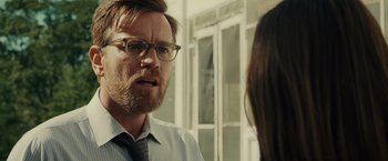 Movie still from “August: Osage County” (2013), directed by John Wells – A man with a beard wearing glasses talking to a woman; Close Up shot, Over the shoulder angle