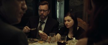 Movie still from “August: Osage County” (2013), directed by John Wells – A man and a woman sitting at a dinner table; Close Up shot, Over the shoulder angle