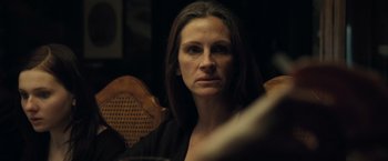 Movie still from “August: Osage County” (2013), directed by John Wells – A person sitting in a chair; Close Up shot, Over the shoulder angle