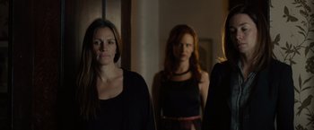 Movie still from “August: Osage County” (2013), directed by John Wells – A group of women standing next to each other in front of a mirror; Medium shot, Over the shoulder angle