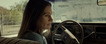 Movie still from “August: Osage County” (2013), directed by John Wells – A woman sitting in the driver's seat of a car; Close Up shot, Over the shoulder angle