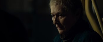 Movie still from “August: Osage County” (2013), directed by John Wells – An older woman is looking into the distance; Close Up shot, Over the shoulder angle