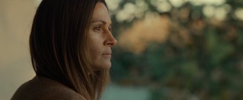 Movie still from “August: Osage County” (2013), directed by John Wells – A person looking away from the camera; Close Up shot, Over the shoulder angle