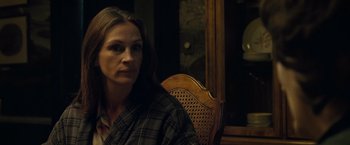 Movie still from “August: Osage County” (2013), directed by John Wells – A woman sitting in a chair in front of a mirror; Close Up shot, Over the shoulder angle