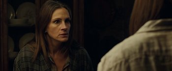 Movie still from “August: Osage County” (2013), directed by John Wells – A woman looking into a mirror while standing next to a man; Close Up shot, Over the shoulder angle