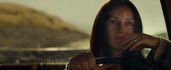 Movie still from “August: Osage County” (2013), directed by John Wells – A woman sitting in the driver's seat of a car; Close Up shot, Over the shoulder angle