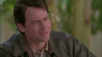 Movie still from “Auto Focus” (2002), directed by Paul Schrader – A person wearing a leather jacket; Close Up shot, Over the shoulder angle