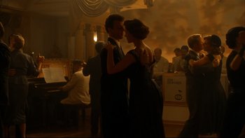 Movie still from “Avalon” (1990), directed by Barry Levinson – A man and a woman dancing in a ballroom; Wide shot, Low angle