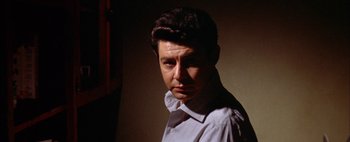 Movie still from “BUtterfield 8” (1960), directed by Daniel Mann – A person wearing a shirt and a tie; Close Up shot, Low angle