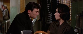 Movie still from “BUtterfield 8” (1960), directed by Daniel Mann – A man and a woman talking to each other; Close Up shot, Over the shoulder angle