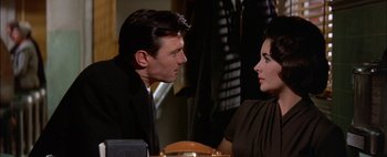 Movie still from “BUtterfield 8” (1960), directed by Daniel Mann – A man and a woman talking to each other; Close Up shot, Over the shoulder angle