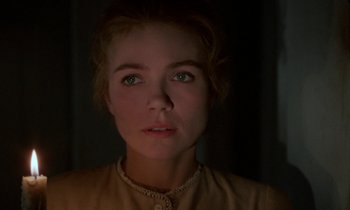 Movie still from “Babette's Feast” (1987), directed by Gabriel Axel – A person wearing a brown shirt; Close Up shot, Low angle