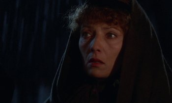 Movie still from “Babette's Feast” (1987), directed by Gabriel Axel – A person wearing a hood; Close Up shot, Low angle