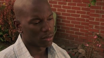 Movie still from “Baby Boy” (2001), directed by John Singleton – A person with his eyes closed; Close Up shot, High angle