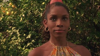 Movie still from “Baby Boy” (2001), directed by John Singleton – A person wearing a dress; Close Up shot, Low angle