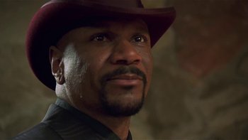 Movie still from “Baby Boy” (2001), directed by John Singleton – A person wearing a hat and looking at the camera; Close Up shot, Low angle