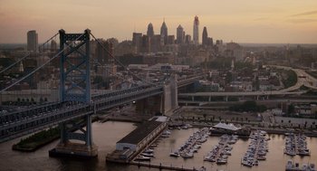 Movie still from “Baby Mama” (2008), directed by Michael McCullers – A view of a bridge and some boats in a body of water; Extreme Wide shot, High angle