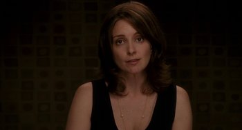 Movie still from “Baby Mama” (2008), directed by Michael McCullers – A person wearing a black shirt; Close Up shot, Over the shoulder angle